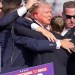 Bloodied Trump rushed off stage after shots fired at rally Bloodied Trump rushed off stage after shots fired at rally