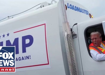 Garbage truck driven by Trump heads to inaugural parade Garbage truck driven by Trump heads to inaugural parade