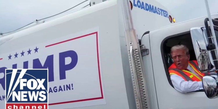 Garbage truck driven by Trump heads to inaugural parade Garbage truck driven by Trump heads to inaugural parade