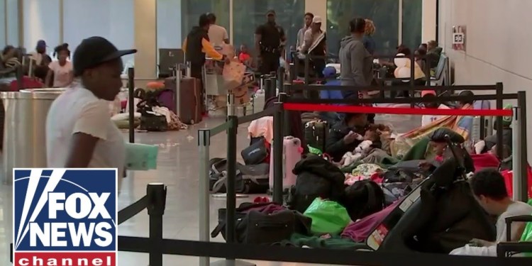 Migrants get boot from major airport Migrants get boot from major airport