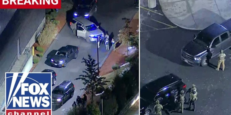 BREAKING: Officers surround building after finding Brown suspect’s abandoned car, report says BREAKING: Officers surround building after finding Brown suspect’s abandoned car, report says