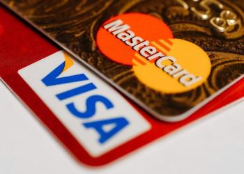 rewrite this title and make it good for SEOVisa, Mastercard agree to bn settlement over merchant fee dispute rewrite this title and make it good for SEOVisa, Mastercard agree to bn settlement over merchant fee dispute