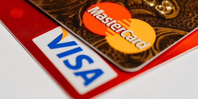 rewrite this title and make it good for SEOVisa, Mastercard agree to bn settlement over merchant fee dispute rewrite this title and make it good for SEOVisa, Mastercard agree to bn settlement over merchant fee dispute
