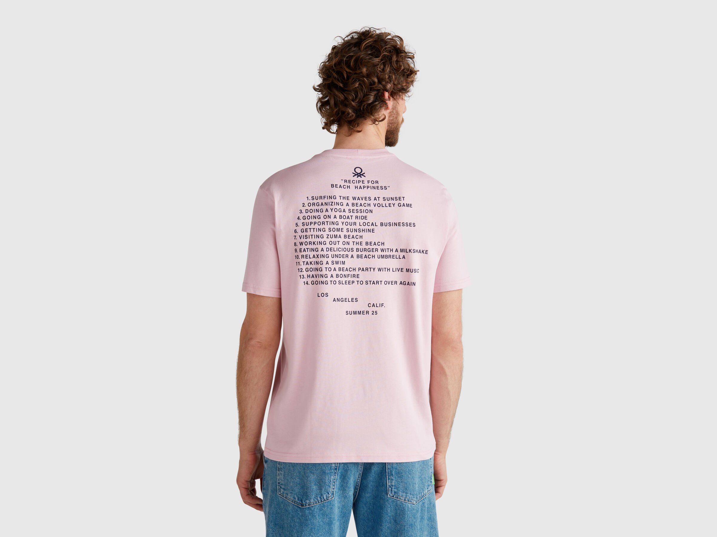 T-shirt rose pastel avec graphismes – Image 2