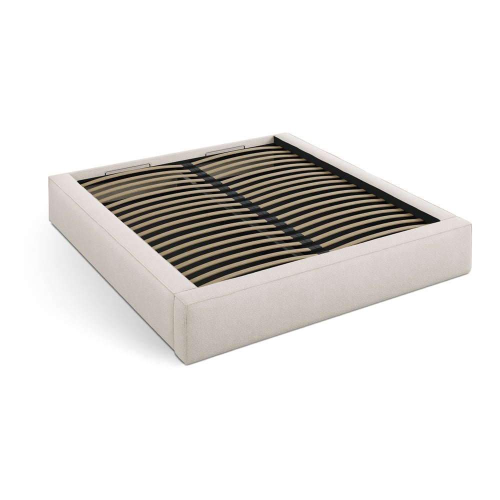 Krémová čalouněná dvoulůžková postel s úložným prostorem s roštem 180×200 cm Simon – Micadoni Krémová čalouněná dvoulůžková postel s úložným prostorem s roštem 180×200 cm Simon – Micadoni