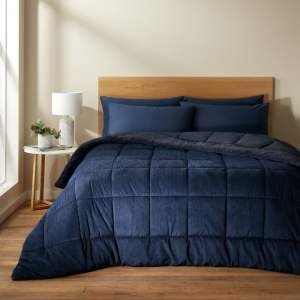 Tmavě modrý prošívaný přehoz z mikroplyše na dvoulůžko 200×220 cm Cosy Cord – Catherine Lansfield