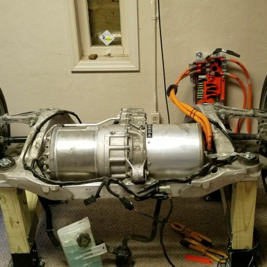 Testing Tesla Motor on Custom Control Package QA/Sale Preparation Bench Testing Tesla Motor on Custom Control Package QA/Sale Preparation Bench