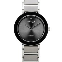 Bering Damen Armbanduhr Charity 29 mm Armband Edelstahlband mit Keramikelementen... Bering Damen Armbanduhr Charity 29 mm Armband Edelstahlband mit Keramikelementen...