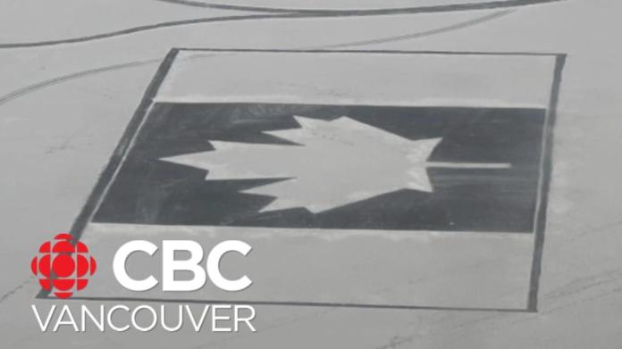 Okanagan homeowners sculpt Canadian flag right into icy lake to commemorate Flag Day Okanagan homeowners sculpt Canadian flag right into icy lake to commemorate Flag Day