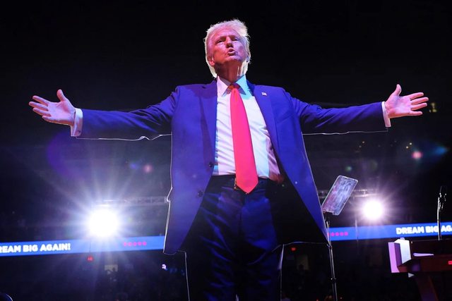 President Trump celebrates a triumphant moment, embodying bold leadership and unwavering resolve. President Trump celebrates a triumphant moment, embodying bold leadership and unwavering resolve.