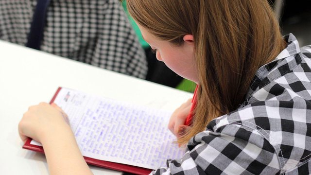 A student navigates the debate over scholarship access as universities face federal scrutiny. A student navigates the debate over scholarship access as universities face federal scrutiny.