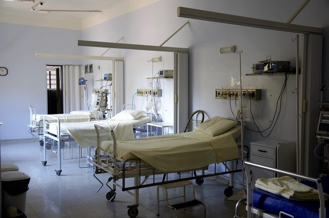 Three hospital beds. Three hospital beds.