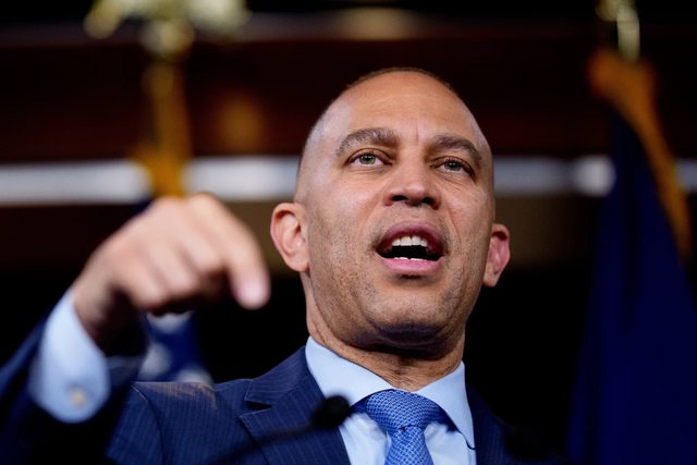 Hakeem Jeffries pointing down. Hakeem Jeffries pointing down.