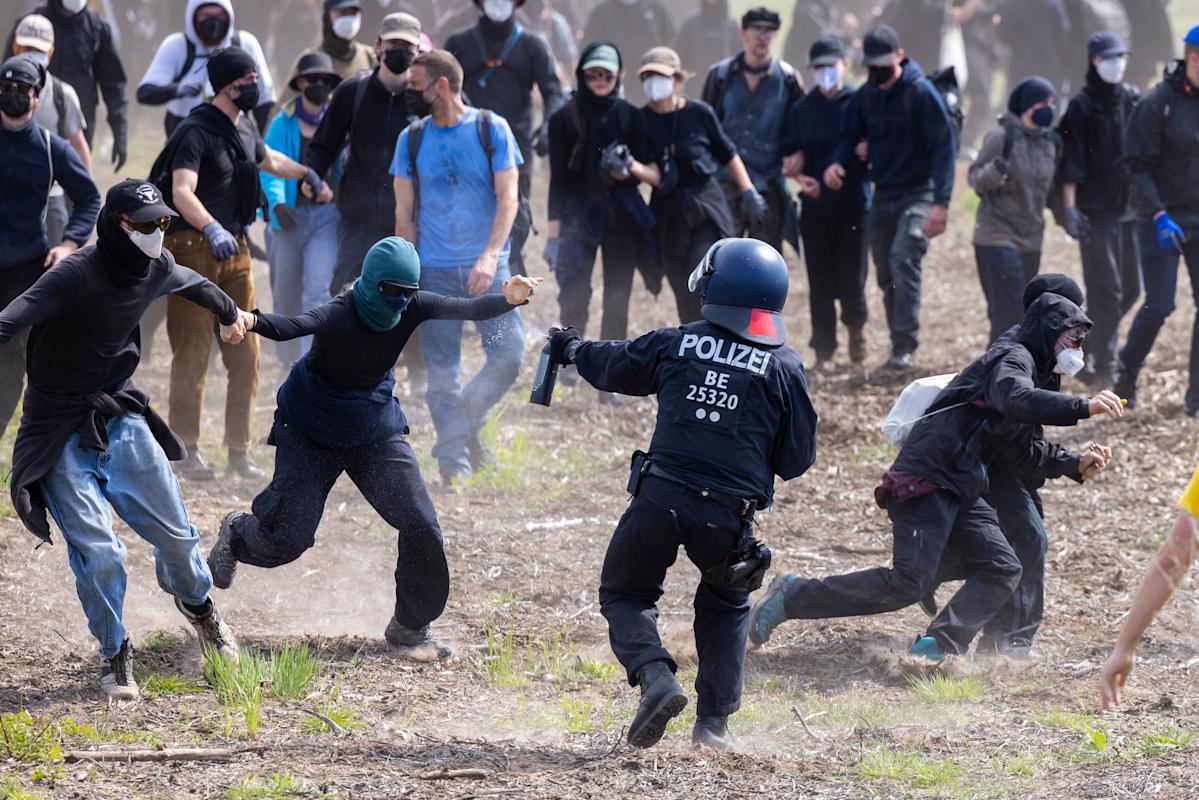 Local weather protestors conflict with police exterior Tesla’s German gigafactory Local weather protestors conflict with police exterior Tesla’s German gigafactory