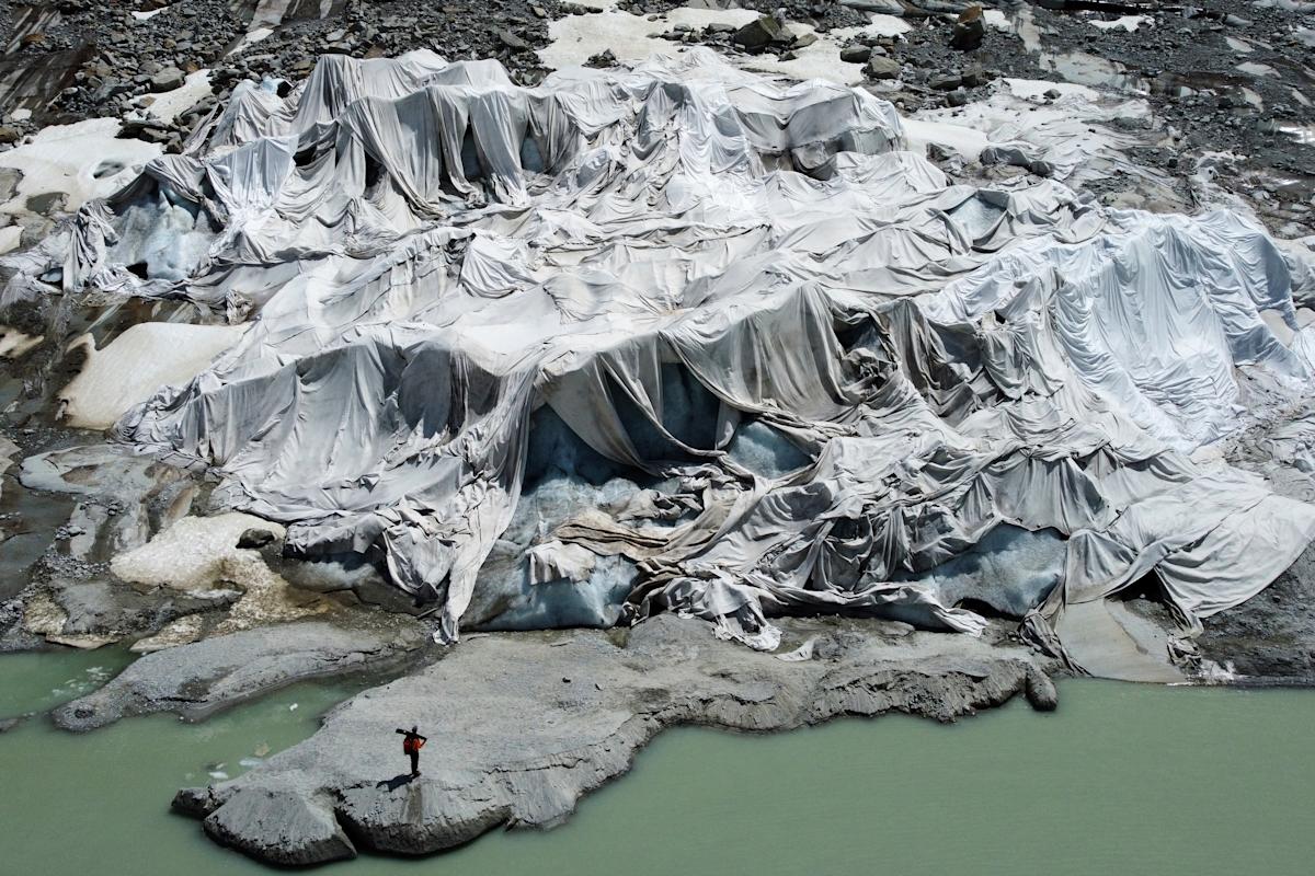 Photos show Swiss glaciers’ uncertain future as ‘ambassadors of climate change’ Photos show Swiss glaciers’ uncertain future as ‘ambassadors of climate change’