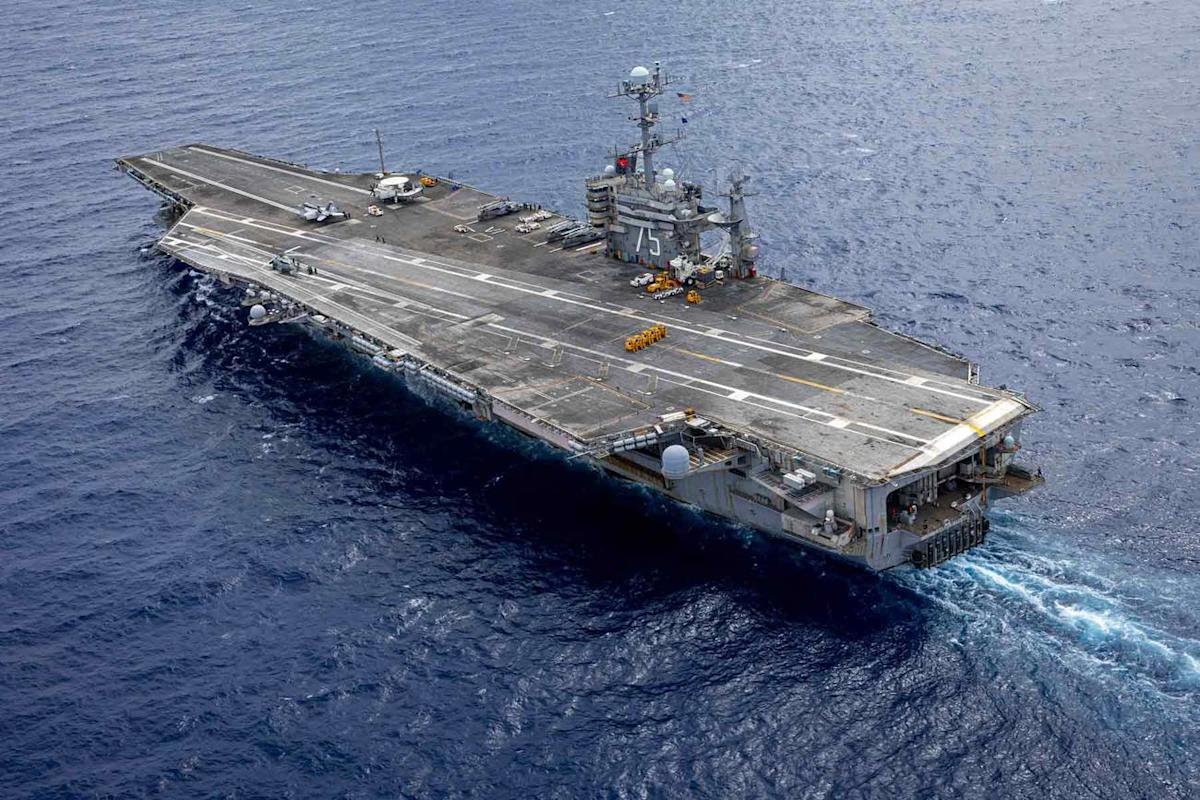 Navy Aircraft Carrier Collides with Merchant Ship Outside Suez Canal Navy Aircraft Carrier Collides with Merchant Ship Outside Suez Canal