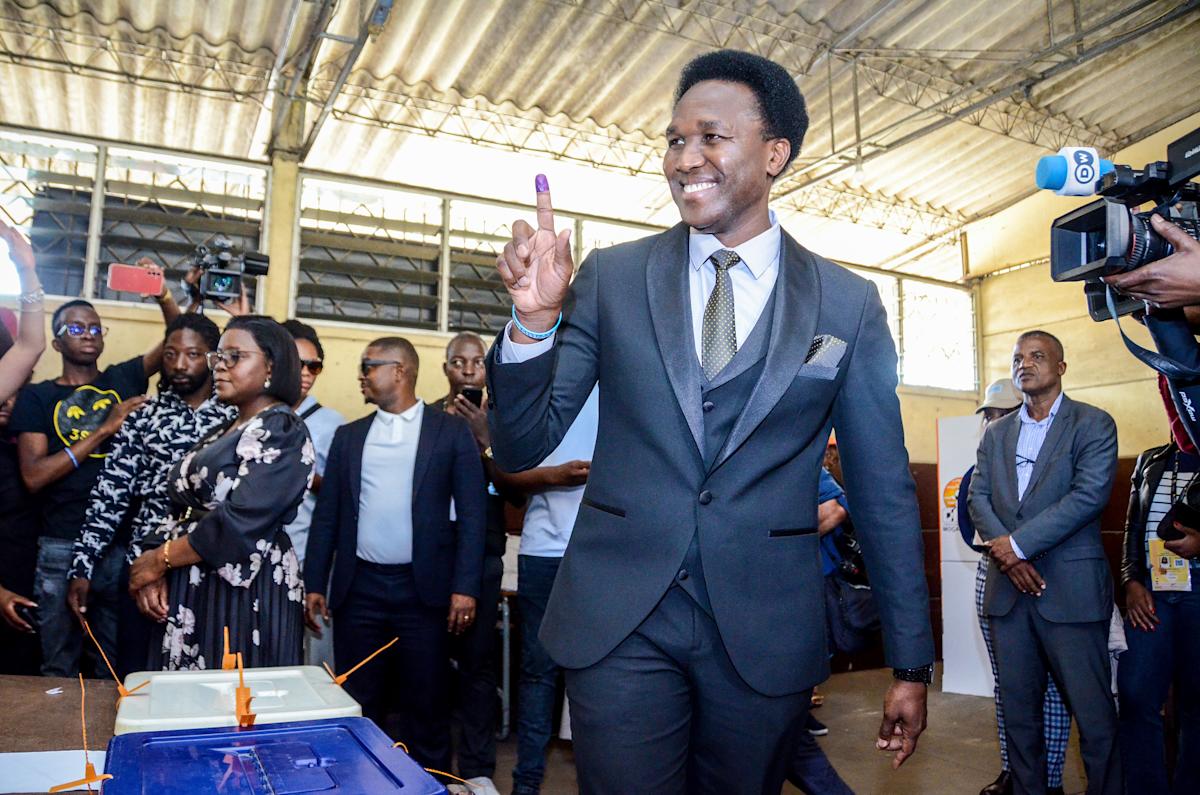 Mozambique opposition leader returns from exile as police fire tear gas at his supporters Mozambique opposition leader returns from exile as police fire tear gas at his supporters