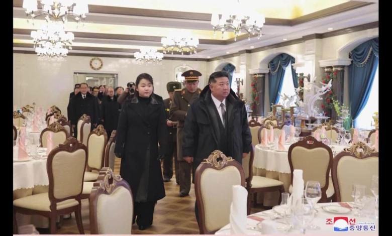 North Korean leader Kim Jong Un and his daughter walk along the beach while visiting new tourist attraction North Korean leader Kim Jong Un and his daughter walk along the beach while visiting new tourist attraction