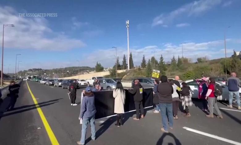 Protesters demanding the handover of hostages briefly blocked the main highway to Jerusalem Protesters demanding the handover of hostages briefly blocked the main highway to Jerusalem