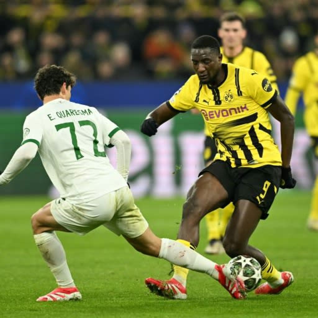 Dortmund ease into Champions League final 16 after Sporting stalemate Dortmund ease into Champions League final 16 after Sporting stalemate
