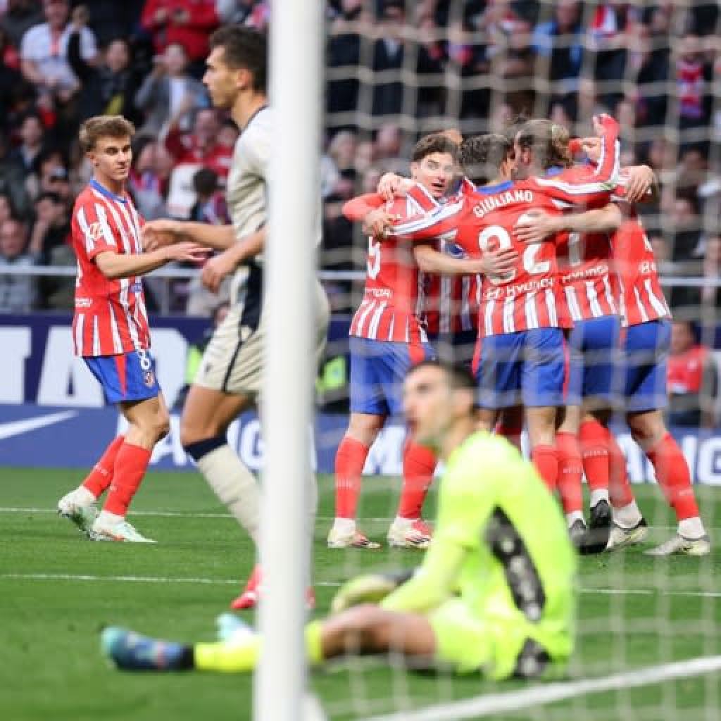 Relentless Atletico declare Liga lead with win over Osasuna Relentless Atletico declare Liga lead with win over Osasuna