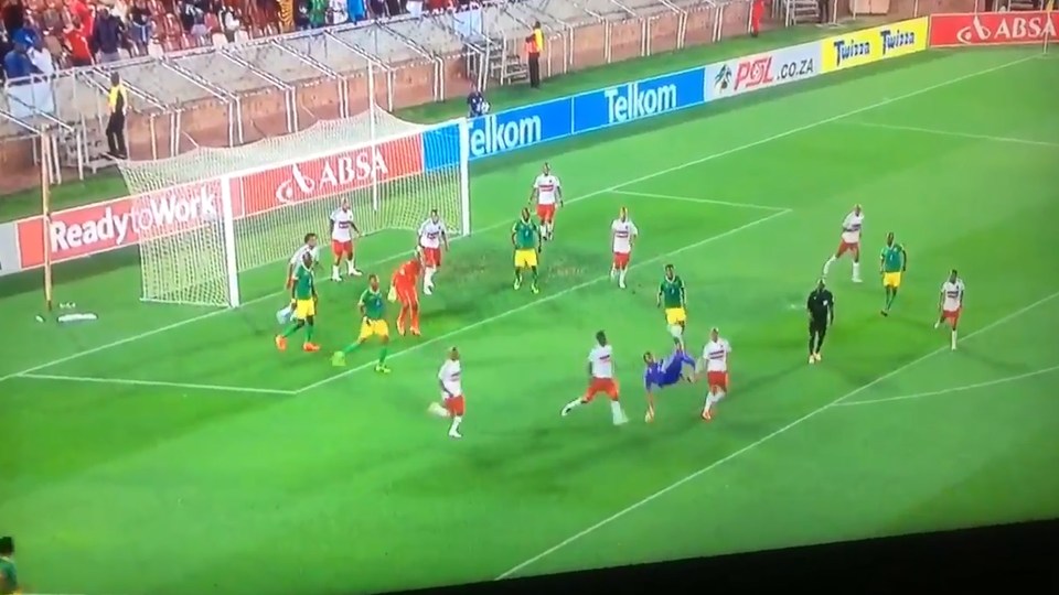 Non-league goalkeeper scores stunning SCISSOR KICK as commentator goes wild Non-league goalkeeper scores stunning SCISSOR KICK as commentator goes wild