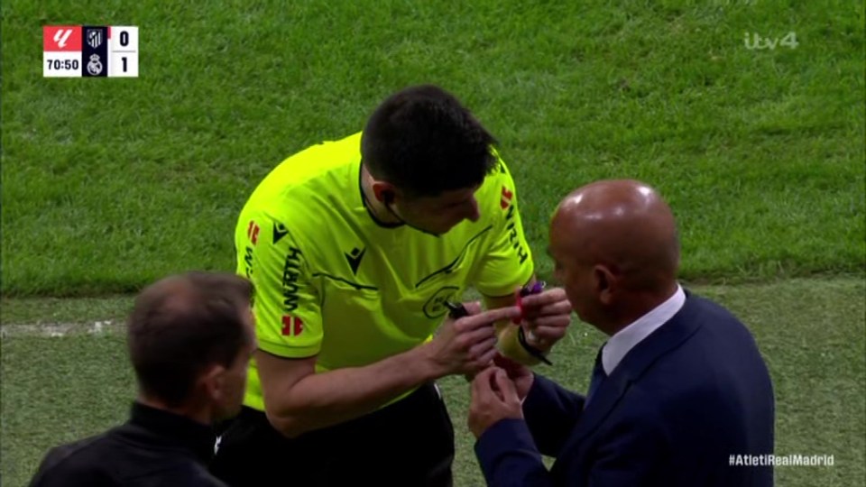 Atletico v Real Madrid SUSPENDED as ref begs players to tell fans to stop Atletico v Real Madrid SUSPENDED as ref begs players to tell fans to stop