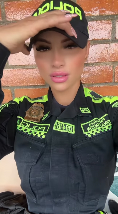 Glam police officer steals the show at football match with 'blinding' beauty Glam police officer steals the show at football match with 'blinding' beauty