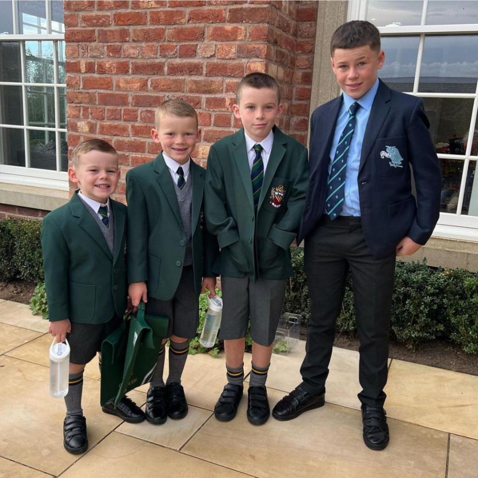 Wayne Rooney's four sons pose in their uniforms ahead of the new school year Wayne Rooney's four sons pose in their uniforms ahead of the new school year