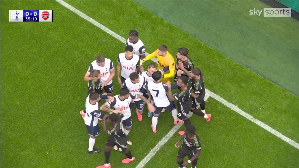 North London derby descends into chaos as Arsenal star grabs Tottenham keeper North London derby descends into chaos as Arsenal star grabs Tottenham keeper