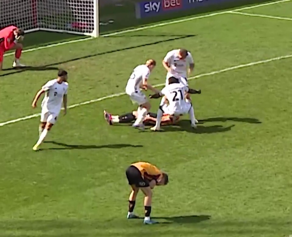 Moment EFL stars celebrate in face of devastated ace who scored own-goal Moment EFL stars celebrate in face of devastated ace who scored own-goal