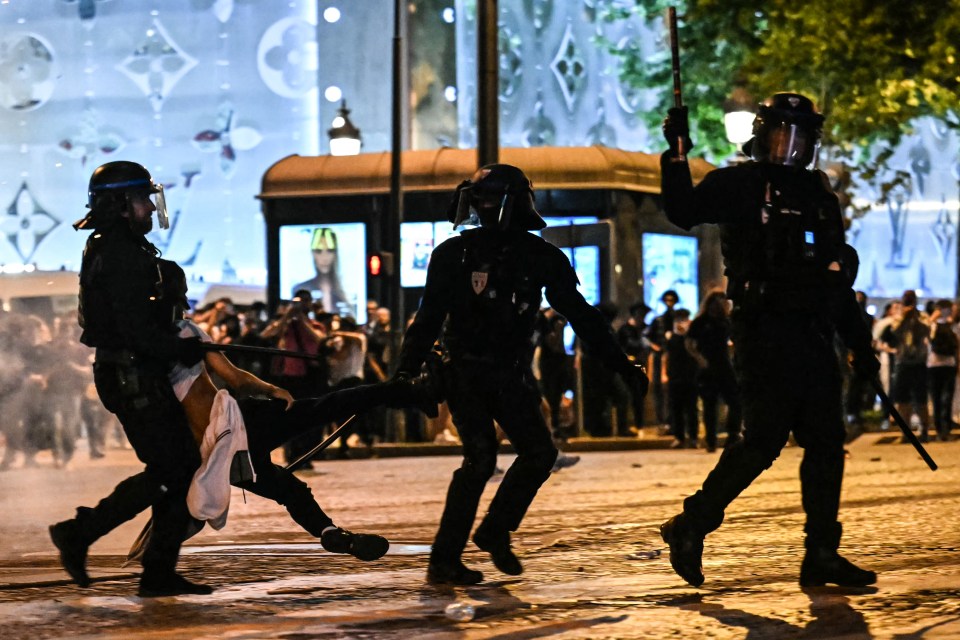 PSG fans 'teargassed' by cops as violence erupts in Paris after CL final win PSG fans 'teargassed' by cops as violence erupts in Paris after CL final win