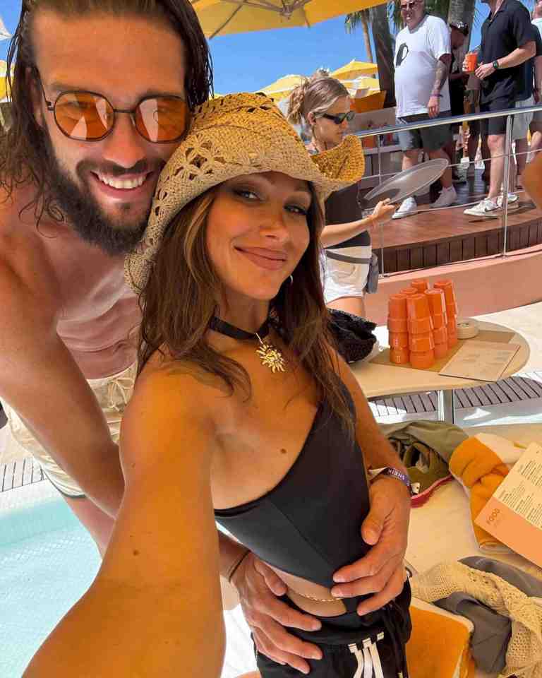 Andy Carroll & Lou Teasdale look loved up as pair walk hand-in-hand in Ibiza Andy Carroll & Lou Teasdale look loved up as pair walk hand-in-hand in Ibiza