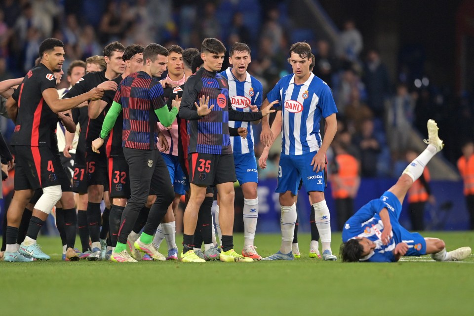 Fuming Espanyol turn sprinklers on as Barcelona celebrate title at fierce rivals Fuming Espanyol turn sprinklers on as Barcelona celebrate title at fierce rivals