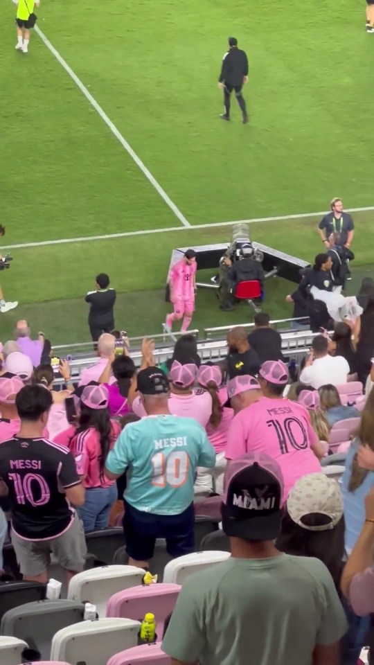Lionel Messi storms straight down the tunnel as team-mates celebrate on pitch Lionel Messi storms straight down the tunnel as team-mates celebrate on pitch