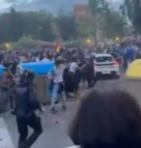 Horrifying moment car ploughs into huge crowd of fans near stadium Horrifying moment car ploughs into huge crowd of fans near stadium