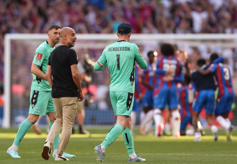 Furious Guardiola and Henderson clash on pitch after Palace's FA Cup triumph Furious Guardiola and Henderson clash on pitch after Palace's FA Cup triumph