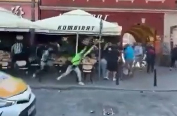 Shocking moment Chelsea fans brawl & throw glasses in Poland ahead of final Shocking moment Chelsea fans brawl & throw glasses in Poland ahead of final