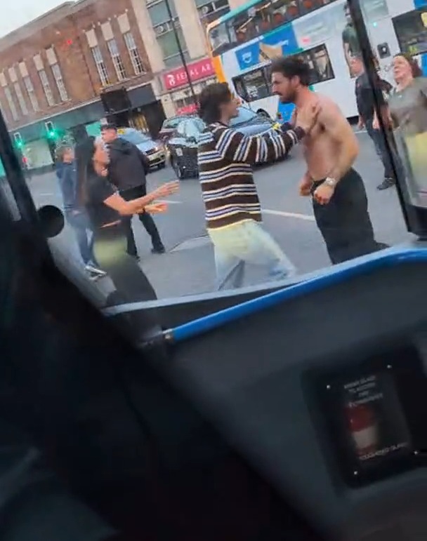 Moment topless Championship ace in 'brawl' after 'pub row' spills into street Moment topless Championship ace in 'brawl' after 'pub row' spills into street