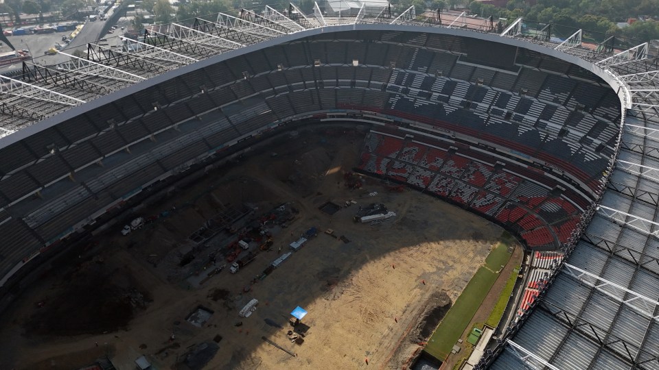 World Cup stadium looks unrecognisable with cranes on pitch and seats ripped out World Cup stadium looks unrecognisable with cranes on pitch and seats ripped out