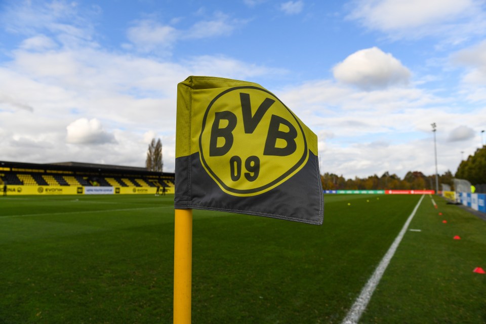Borussia Dortmund forced to move 140 miles away after flu shuts training ground Borussia Dortmund forced to move 140 miles away after flu shuts training ground