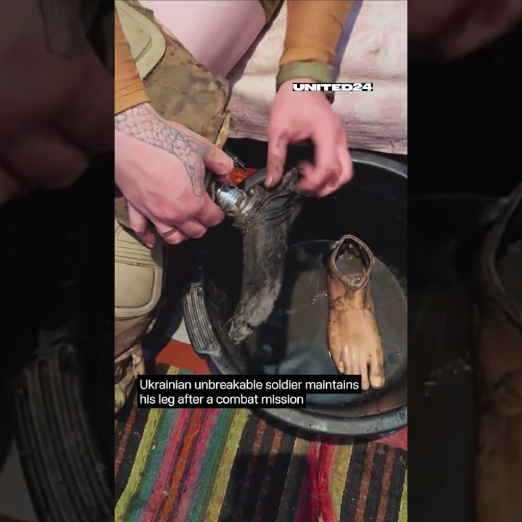 Ukrainian unbreakable soldier maintains his leg after a combat mission #warinukraine #shorts Ukrainian unbreakable soldier maintains his leg after a combat mission #warinukraine #shorts