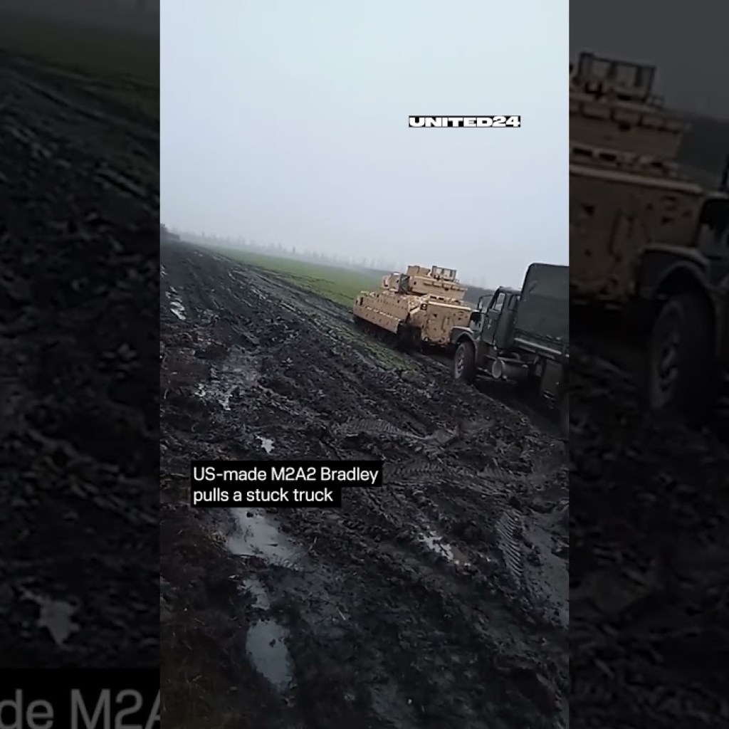 US-made M2A2 Bradley pulls a stuck truck ? #warinukraine #counteroffensive #shorts US-made M2A2 Bradley pulls a stuck truck ? #warinukraine #counteroffensive #shorts