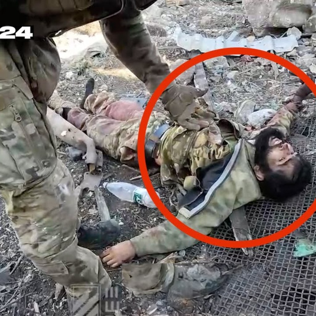 Ukraine soldiers help & capture wounded Russian major near Bakhmut. 3rd Assault Brigade Ukraine soldiers help & capture wounded Russian major near Bakhmut. 3rd Assault Brigade