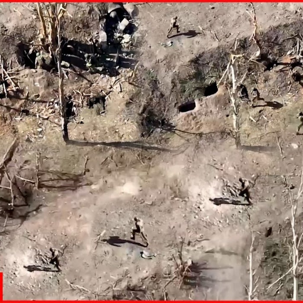 Scene of Russian invaders escaping drone after leaving their “nest” Scene of Russian invaders escaping drone after leaving their “nest”