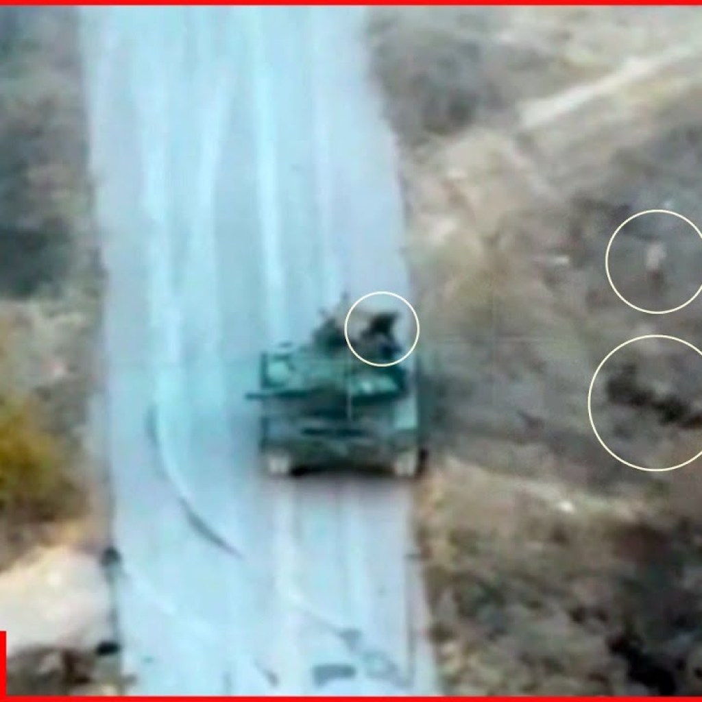 Ukrainian drone puts the moving Russian tank and its crew members in a difficult situation Ukrainian drone puts the moving Russian tank and its crew members in a difficult situation