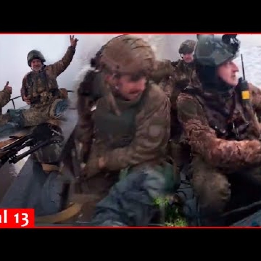 Cheerful Ukrainian fighters arrive on the bank of Dnipro River by boat Cheerful Ukrainian fighters arrive on the bank of Dnipro River by boat