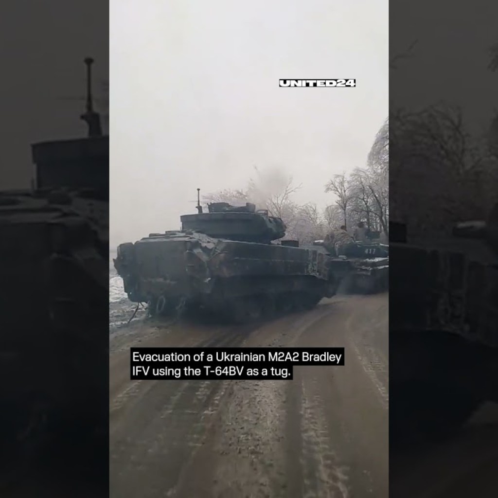 Evacuation of a Ukrainian M2A2 BradleyIFV using the T-64BV as a tug #warinukraine #shorts Evacuation of a Ukrainian M2A2 BradleyIFV using the T-64BV as a tug #warinukraine #shorts