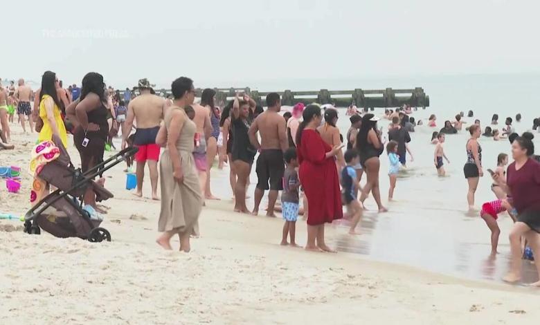 People enjoy summer breathing at Rehobos Beach during hot consultation warning People enjoy summer breathing at Rehobos Beach during hot consultation warning