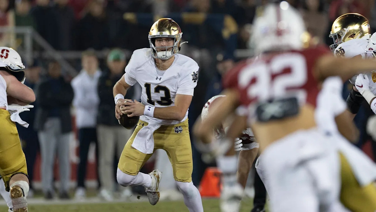 Love gets hurt but returns as No. 9 Notre Dame routs Stanford 49-20 Love gets hurt but returns as No. 9 Notre Dame routs Stanford 49-20